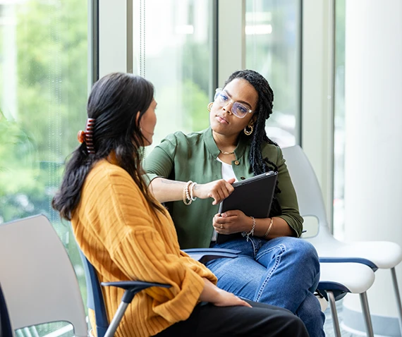 two women deep in conversation