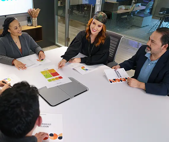 5 coworkers at table