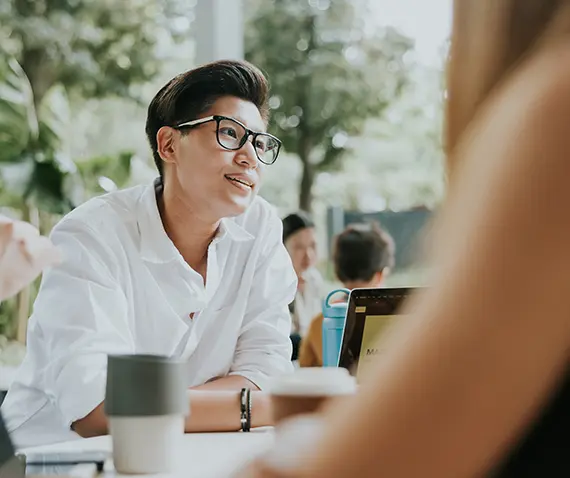 Smiling man in conversation