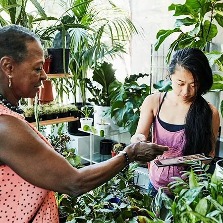 two people at plant nursery