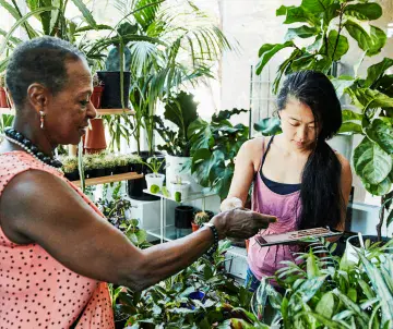 two people at plant nursery