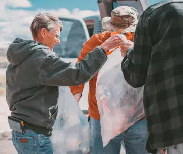 people collecting recyclables